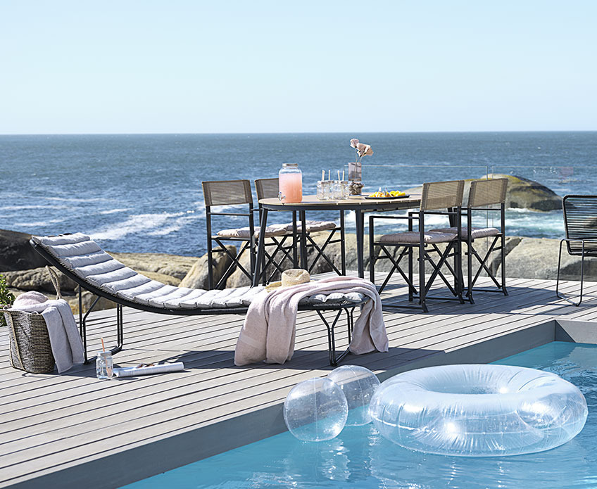 NAGELSTI chairs and TAGEHOLM table Outdoor garden furniture by a swimming pool, close to the ocean