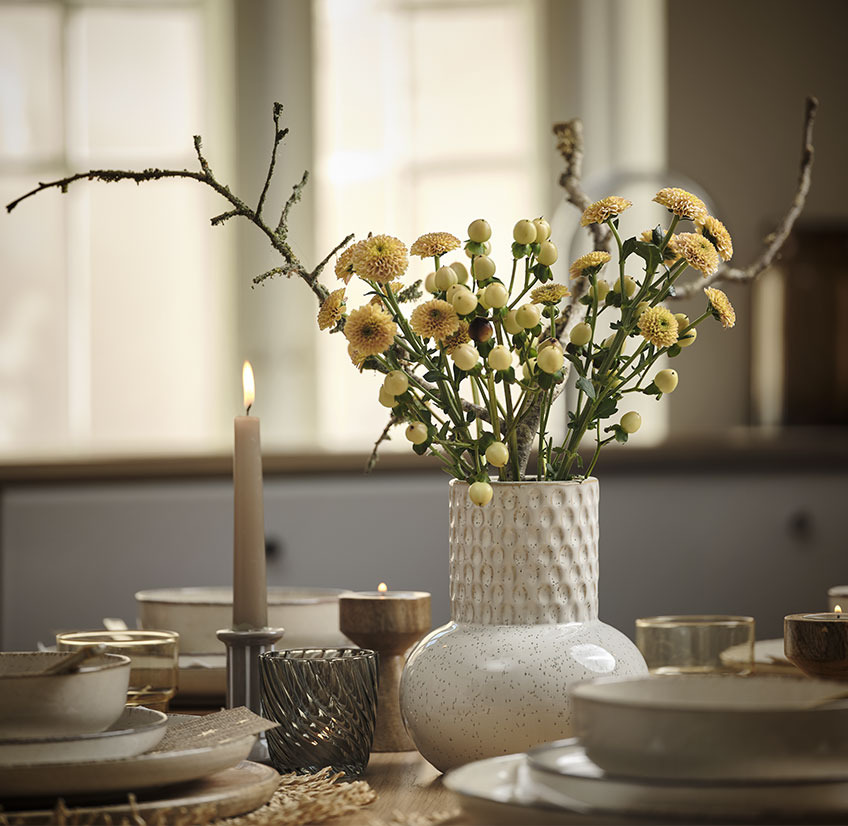 INGBERT vase and VAGN tealight holder Stoneware vase with yellow flowers