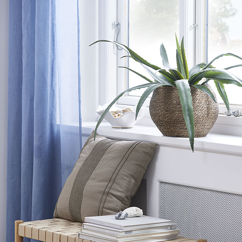 NATTLILJA cushion and SIVERT plant pot with CELIUS artificial plant Windowsill with artificial plant in wicker plant pot