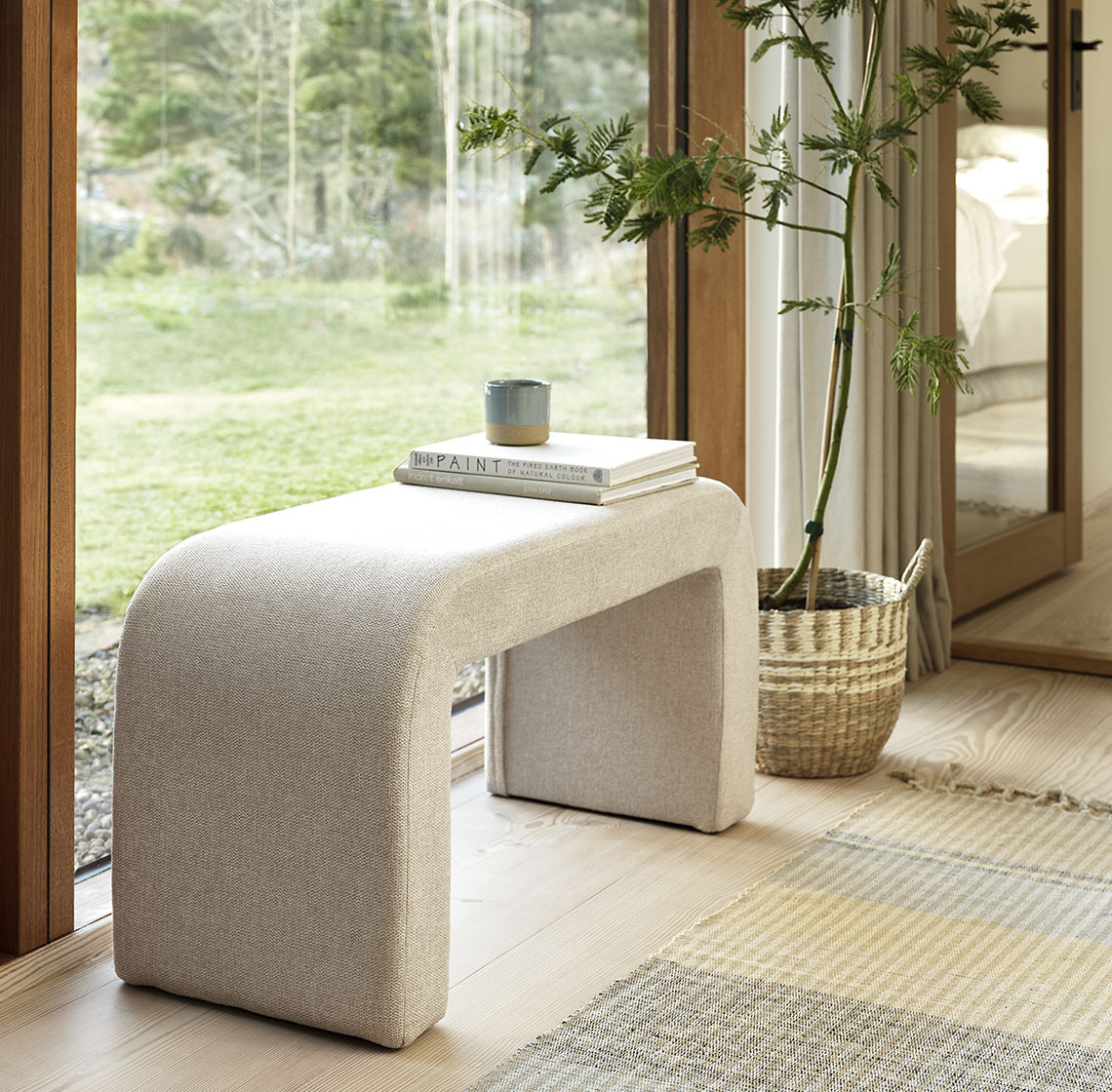 TUEN bench is a stylish addition to any room Sculptural bench in living room