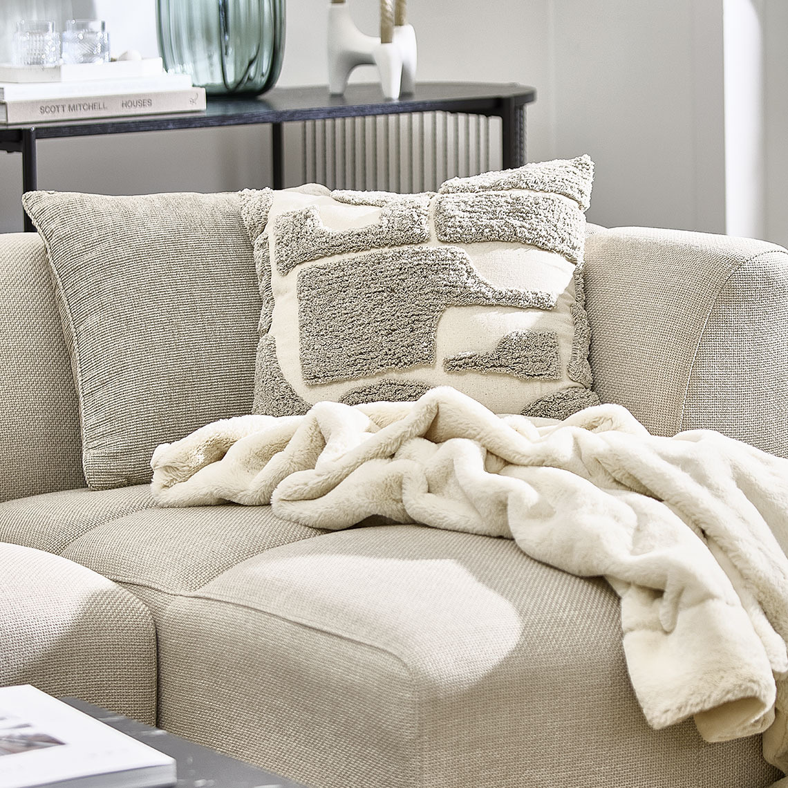 FJELLFIOL warm grey/beige cushion, DVERGFAKS patterned cushion and KALKLOK beige throw Beige sofa with cushions and a throw