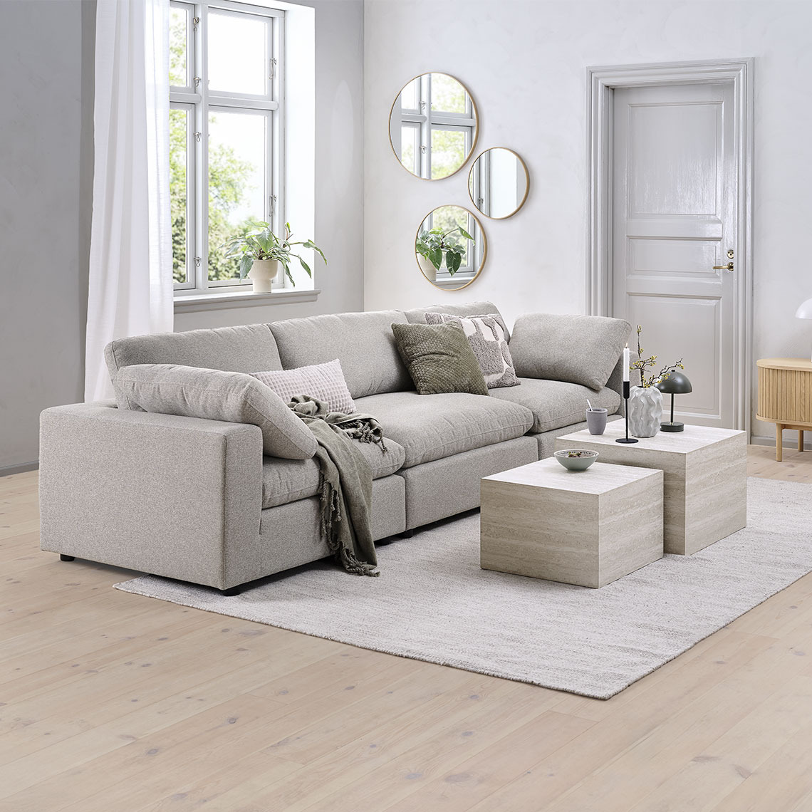 LUNDBY modular sofa Beige modular sofa reconfigured to a 3-seater sofa in a living room area