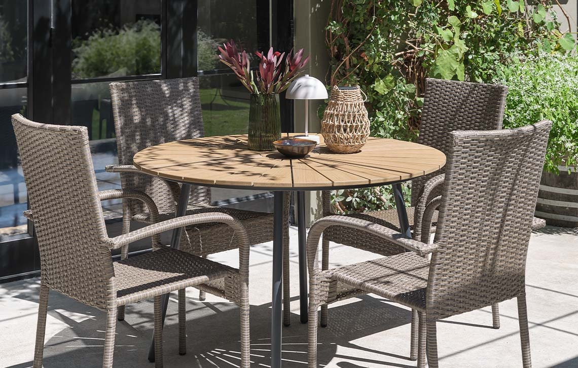 RANGSTRUP garden table with artificial wood table top and GUDHJEM polyrattan garden chairs Artificial wood garden table and moulded plastic garden chairs
