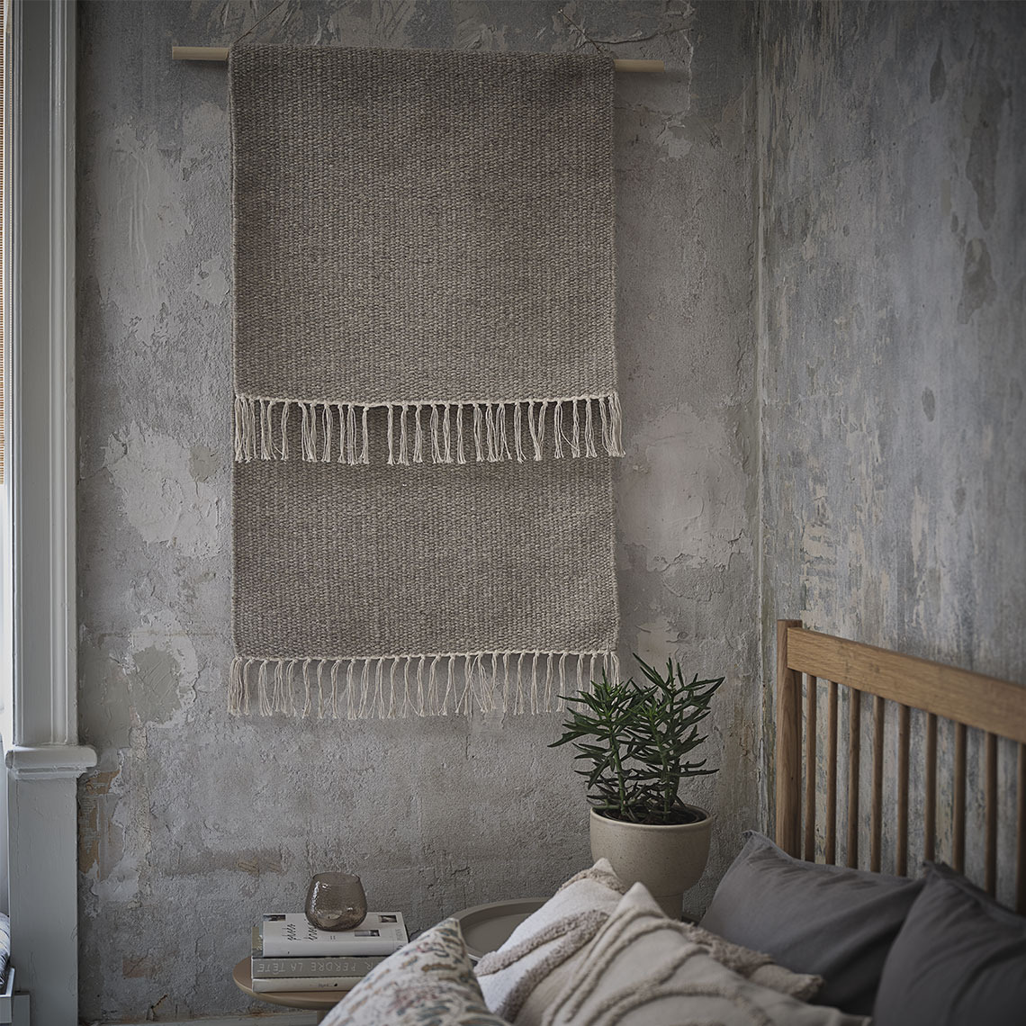 MAIGULL rugs Grey rugs hanging on a wall