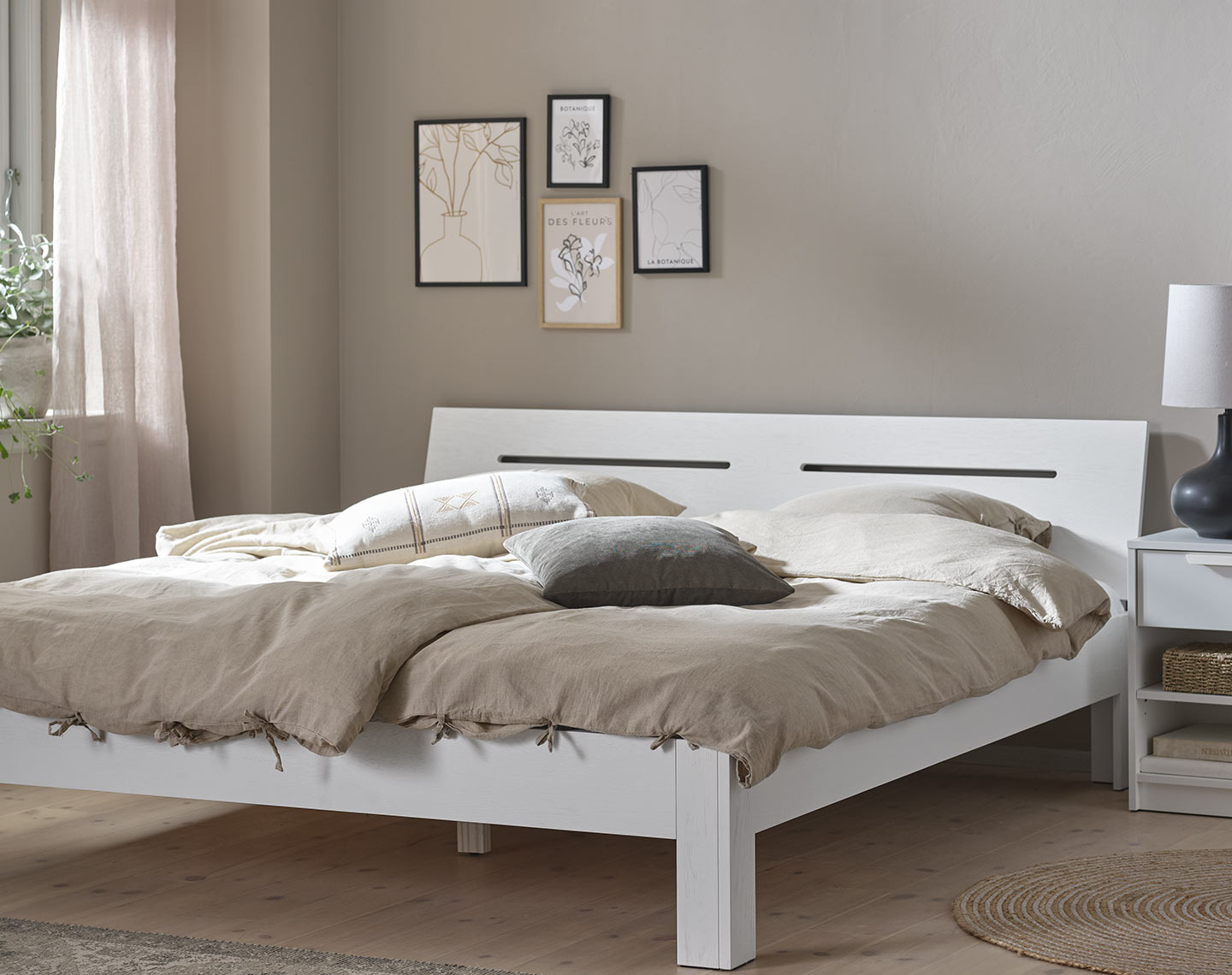 OLSKER bed frame White, wooden bed frame in a bedroom