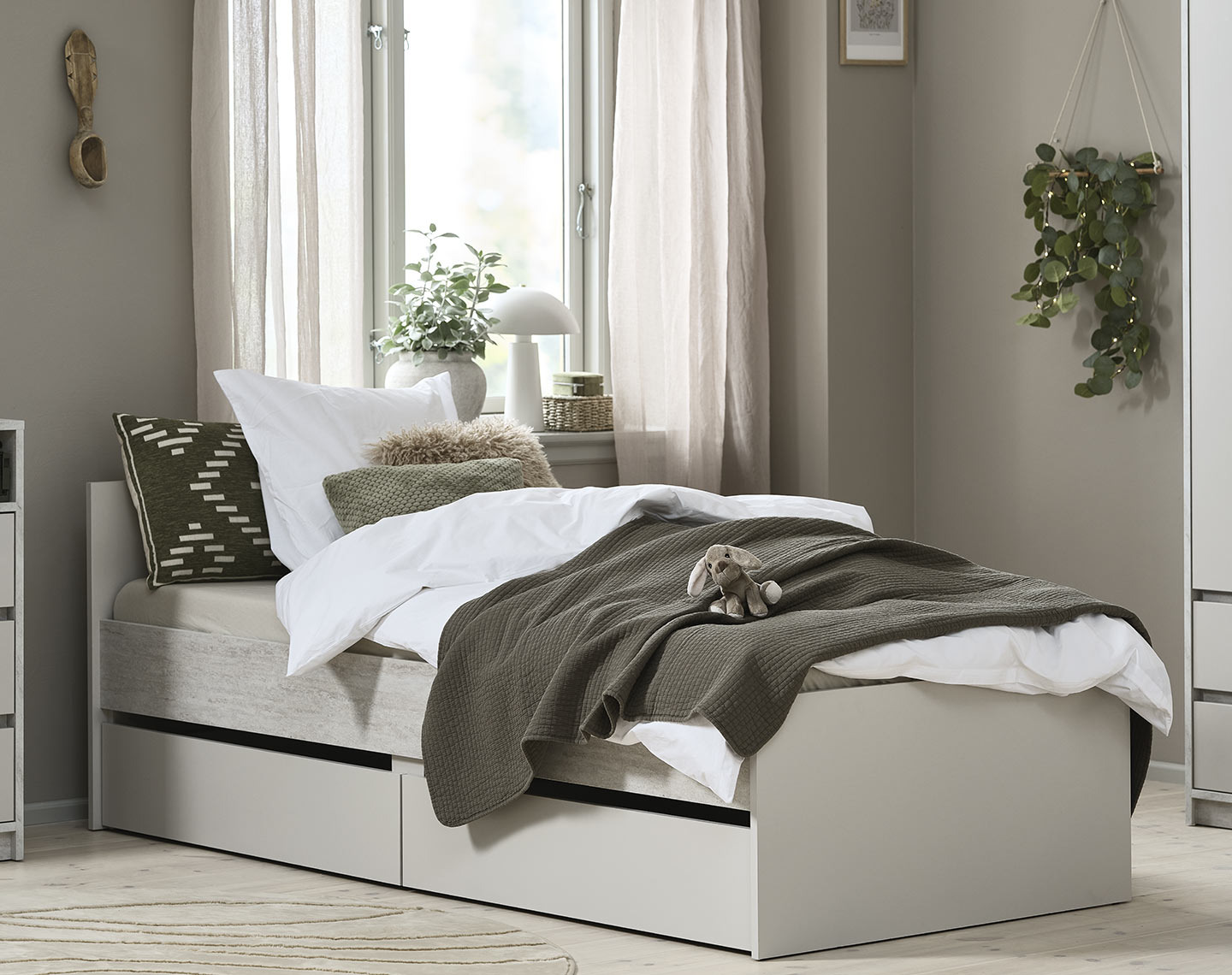 BILLUND bed frame with drawers Bed frame with storage in a bedroom
