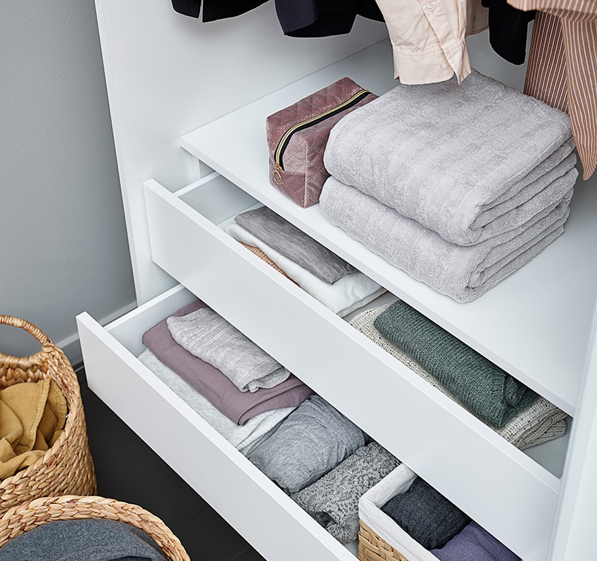 TARP wardrobe with drawers, TORSBY towels and KINNA toiletry bag Wardrobe interiors with drawers, towels and clothes