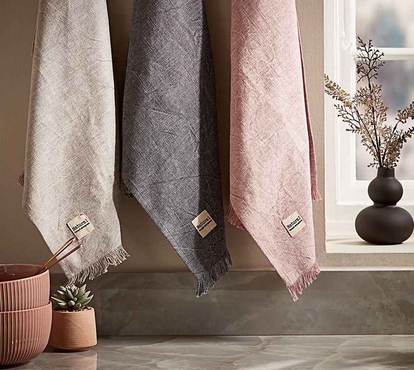 SIVBLOM teatowels Three tea towels hanging in a kitchen