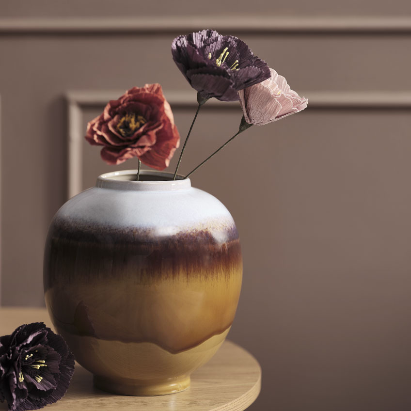 MADS vase with PER artificial flowers in various colours Multicoloured vase on table with artificial flowers in red, purple, and pink